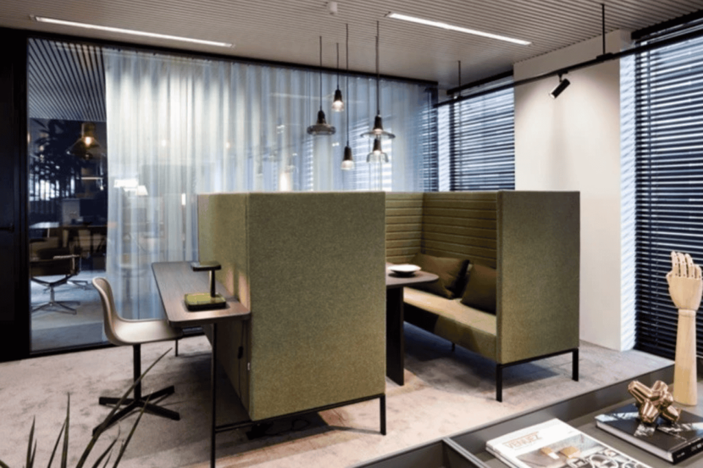 Office design by Buro Project with acoustic booth seating and a quiet consultation and focus zone.